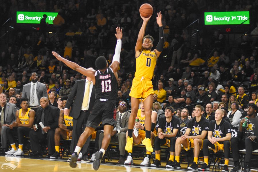 Wichita State sophomore Dexter Dennis shoots a three-pointer during the game against the Omaha Mavericks on Tuesday, Nov. 5 in Charles Koch Arena.