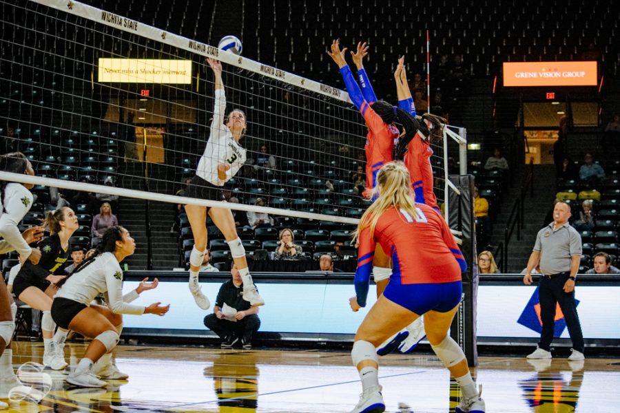 Freshman Brylee Kelly jumps to attack the ball during Wichita States match against Southern Methodist University on Friday, Nov. 8 in Charles Koch Arena.