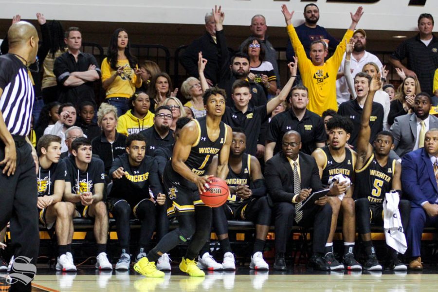 Wichita State freshman Tyson Etienne prepares to shoot a three during the second half of the game against Oklahoma State on Sunday inside Gallagher-Iba Arena.