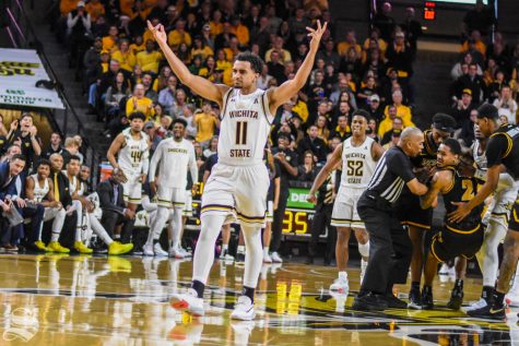 Freshman Noah Fernandes calls for the fans to cheer louder during the game against VCU on Saturday, Dec. 21 inside Charles Koch Arena.