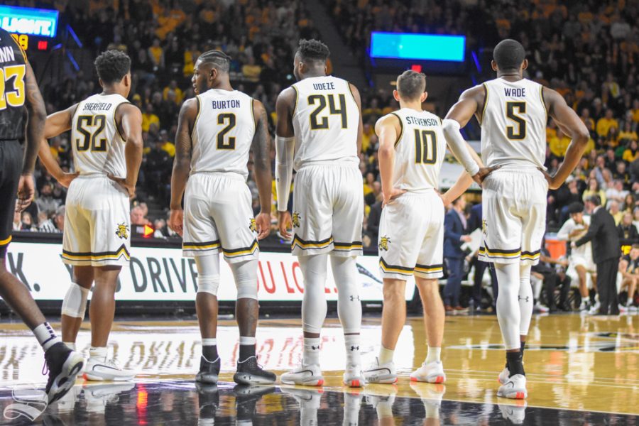 Wichita State players stand togther and look to Head Coach Gregg Marshall after a foul was called during the first half of the game against VCU on Saturday inside Charles Koch Arena. Sherfield, Burton and Stevenson have all transferred away from the program. 