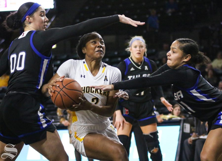 Wichita States Mariah McCully drives toward the basket during the game against Tulsa at Charles Koch Arena on Wednesday, Jan. 15, 2020.