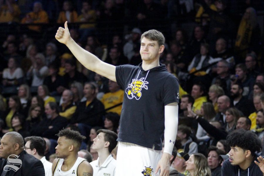Wichita State junior Asbjørn Midtgaard gives a thumbs up during the second half of the game against Central Florida on Jan. 25 inside Charles Koch Arena.