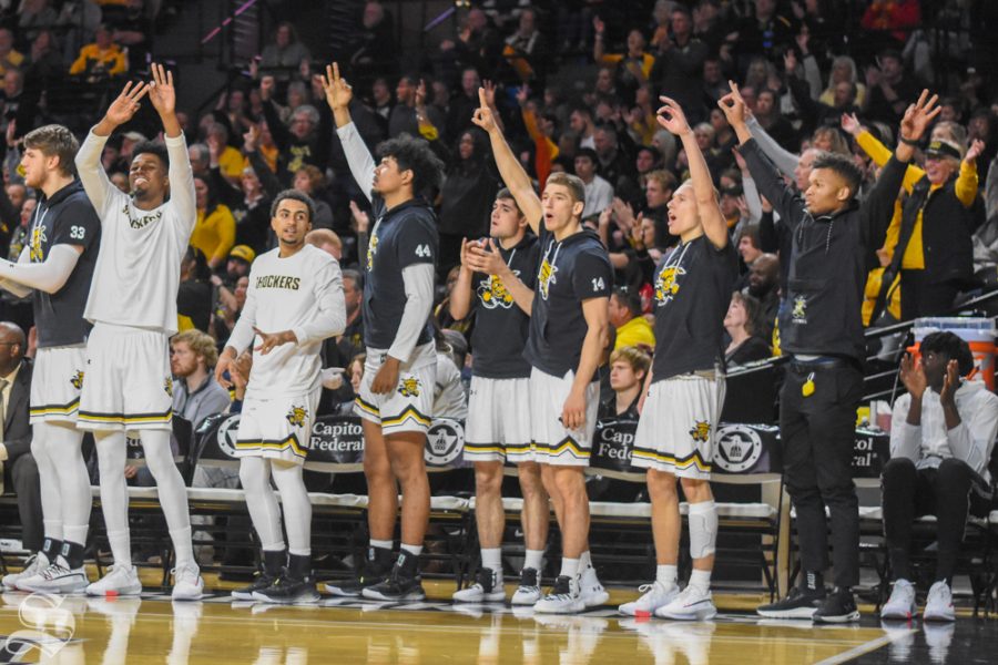 Wichita States bench celebrates after a three-point shot was made against the East Carolina Pirates on Wednesday.