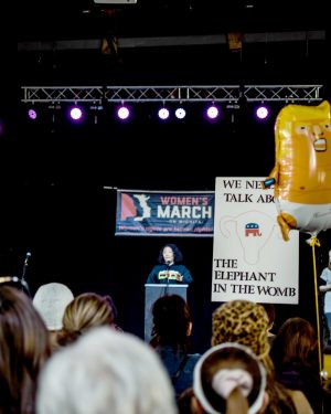 Danielle Johnson, Assistant Director of Office of Diversity and Inclusion, speaks at the Women's March on Jan. 25.