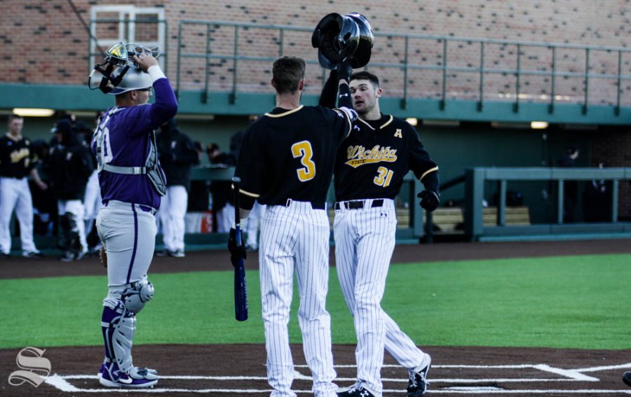 Wichita+State+freshman+Cade+Clemons+celebrates+after+hitting+a+home+run+during+the+third+inning+of+the+game+against+Kansas+State+on+Feb.+26+at+Eck+Stadium.+