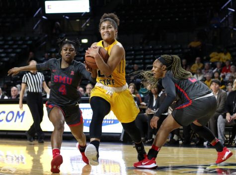 Wichita States Seraphine Bastin breaks past Southern Methodists defense during the second half of the game at Charles Koch Arena on Wednesday, Feb. 19, 2020.