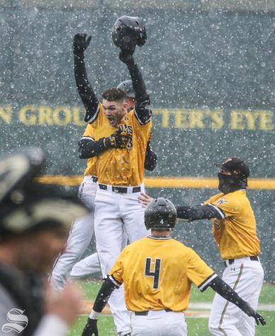 Wichita States Cade Clemons celebrates after hitting a walk-off against Arkansas-Pine Bluff at Eck Stadium in February. 