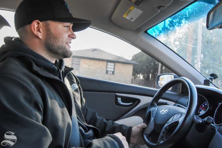 Graduate student Easton Herring answers questions during a drive-along interview with The Sunflower on Jan. 20.