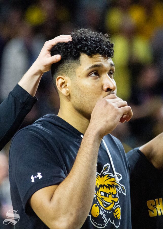 Wichita State senior Jaime Echenique points towards the sky prior to the game against Tulsa on March 8 inside of Charles Koch Arena. 