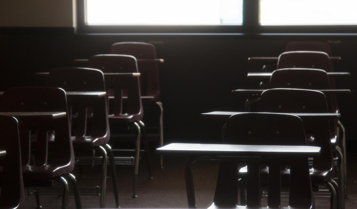 Empty desks in an Elliott Hall classroom on Monday, March 23, 2020 (File photo).