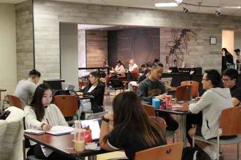 Students congregate by the Rhatigan Student Center Starbucks on March 12, 2020.