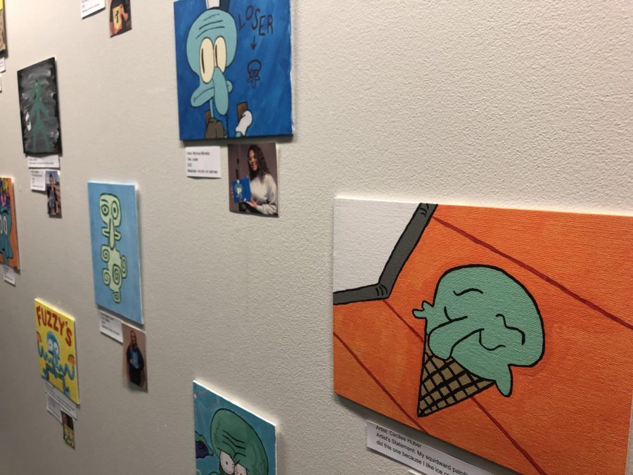 Paintings of the character Squidward from the children television show SpongeBob SquarePants, fills the walls of the Looking Glass at the Cadman Gallery in the Rhatigan Student Center.