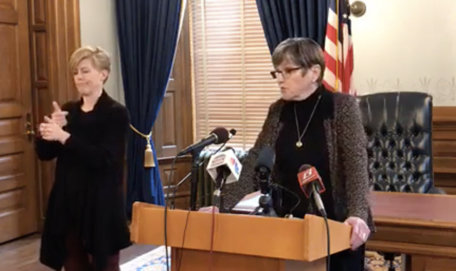 Kansas Gov. Laura Kelly speaks at a media briefing on March 23 announcing the public gathering limit would decrease from 50 to 10.