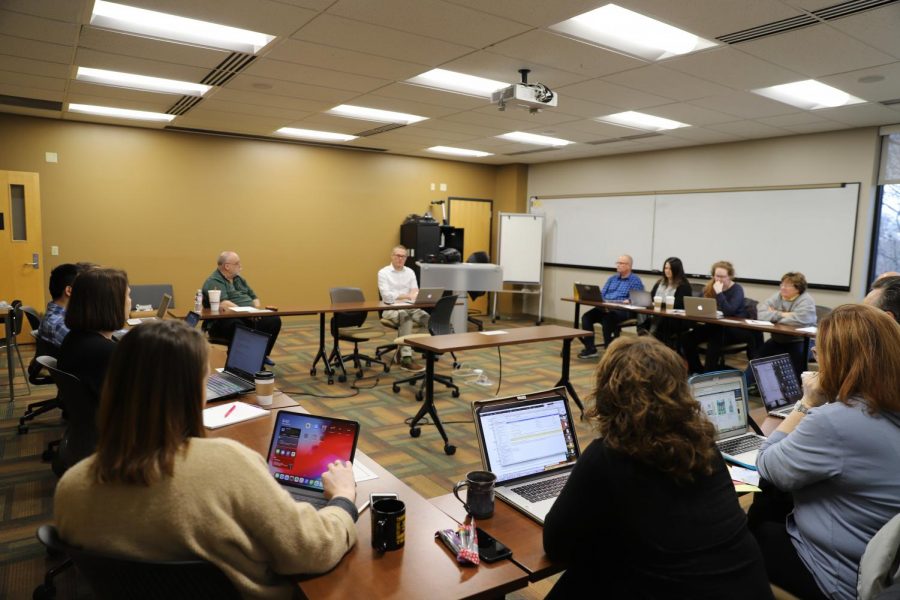 Faculty in the Elliott School of Communication meet Friday morning to go over expectations for next week’s suspended academic activity and online instruction starting March 30.