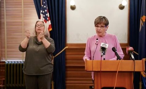 Kansas Governor Laura Kelly speaks on Tuesday at a news conference about the coronavirus. She said the state will move into a
