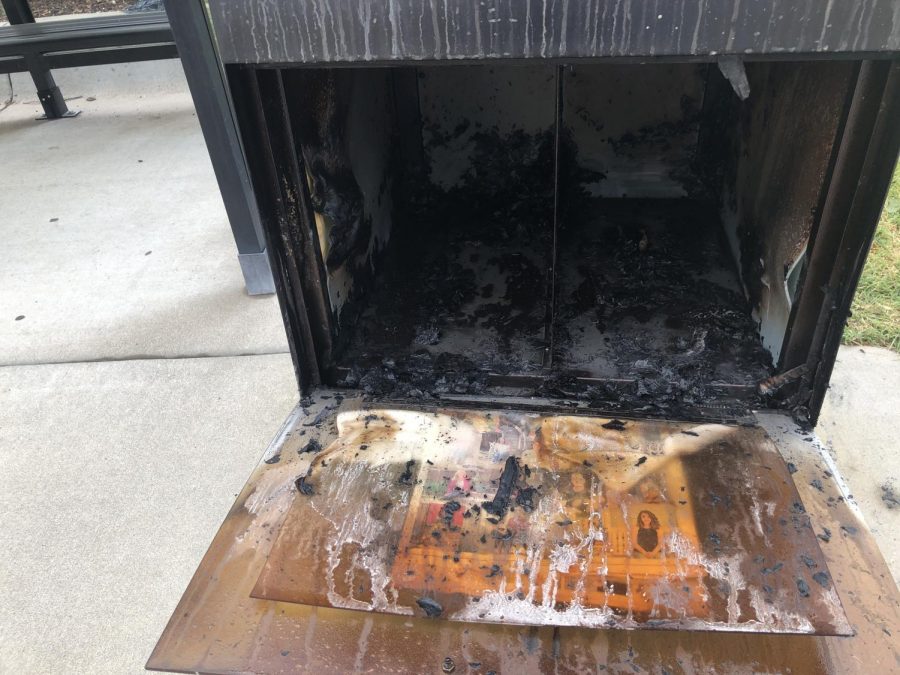 The Sunflowers newsstand at the Duerksen Fine Arts Center bus stop was set on fire Friday afternoon. Police are asking for the publics help in finding the culprit.