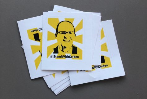 Sierra Bonn, who studies engineering technology management at Wichita State, created #IStandWithGolden stickers and t-shirts. She passed out the stickers last week at the food truck plaza.