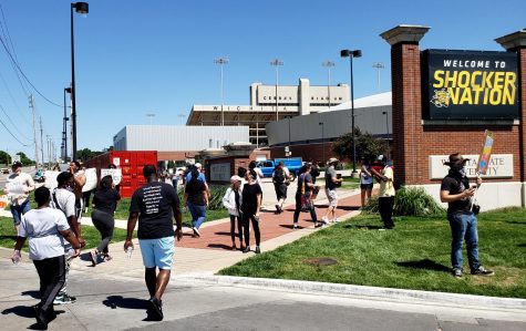 Students and Wichita community members gathered for a protest against police brutality at the Wichita police station near WSU's main campus on Saturday, May 30. Members of the campus community are working with the mayor's civil rights council to address issues like diversity and police brutality.