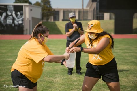 Two students from the College of Arts and Liberal Sciences collaborate on a game as part of the Clash of the Colleges' in-person event on Friday. A winner will be crowned in September, after virtual games wrap up.