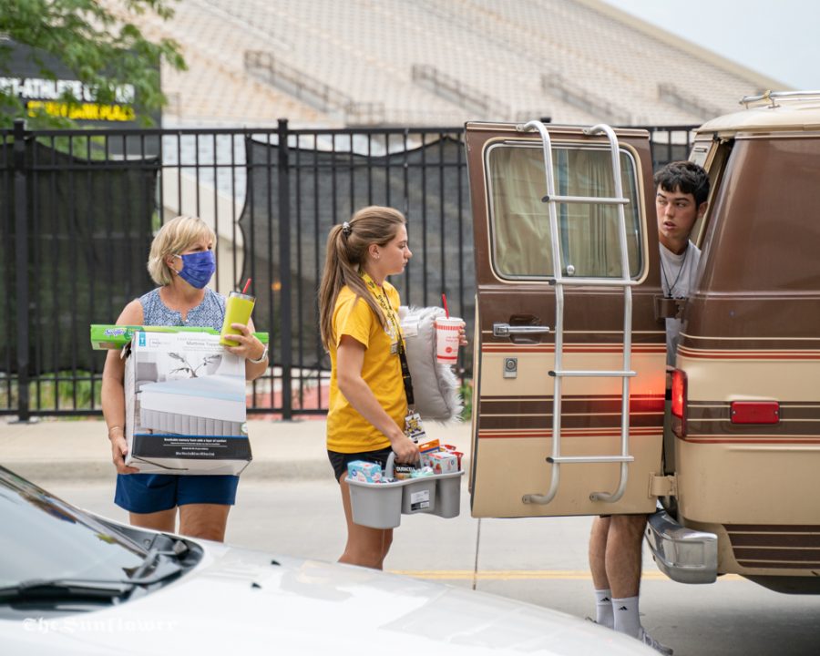 More than 1,000 students are moving into Shocker Hall, The Flats and The Suites this month. The university added safety precautions to keep residents distanced and masked while moving in.