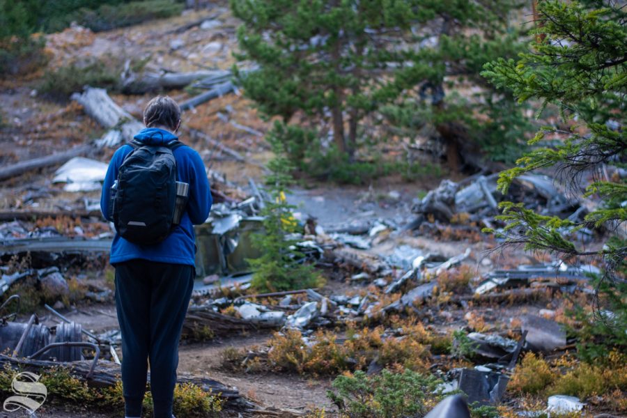 Sports editor for The Sunflower, Sean Marty, observes the 1970 Wichita State plane crash site on Sunday, Sept. 27 near Silver Plume, Colorado. 50 years ago, WSUs football team was flying through the Dry Gulch when the plane crashed into the side of a mountain on Oct. 2, 1970. 31 out of the 40 people on board were killed. Pieces from the crash still remain at the crash site.