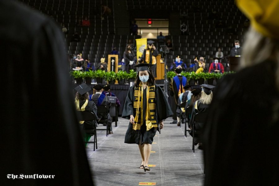 Fine Arts grad Lilian Tay walks off stage after getting recognized at the Spring 2020 Commencement.