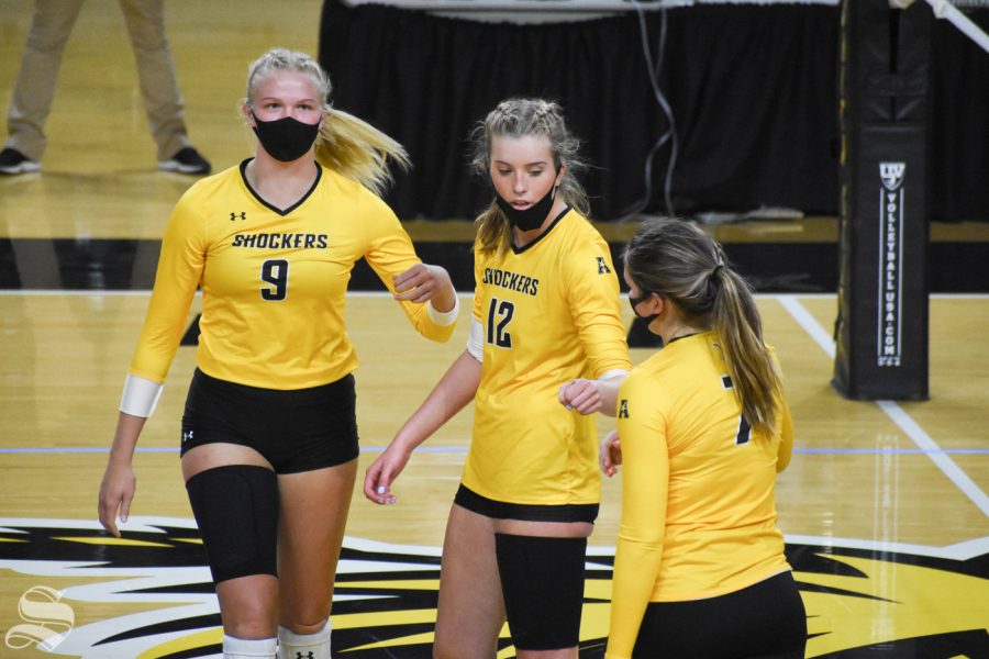 Wichita State freshman Lauren McMahon celebrates with her team after scoring against the black team on Friday, Oct. 16.