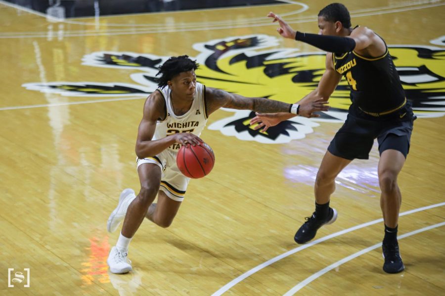 Wichita State sophomore Clarence Jackson drives to the basket during the game against Missouri at Charles Koch Arena on Dec. 6.