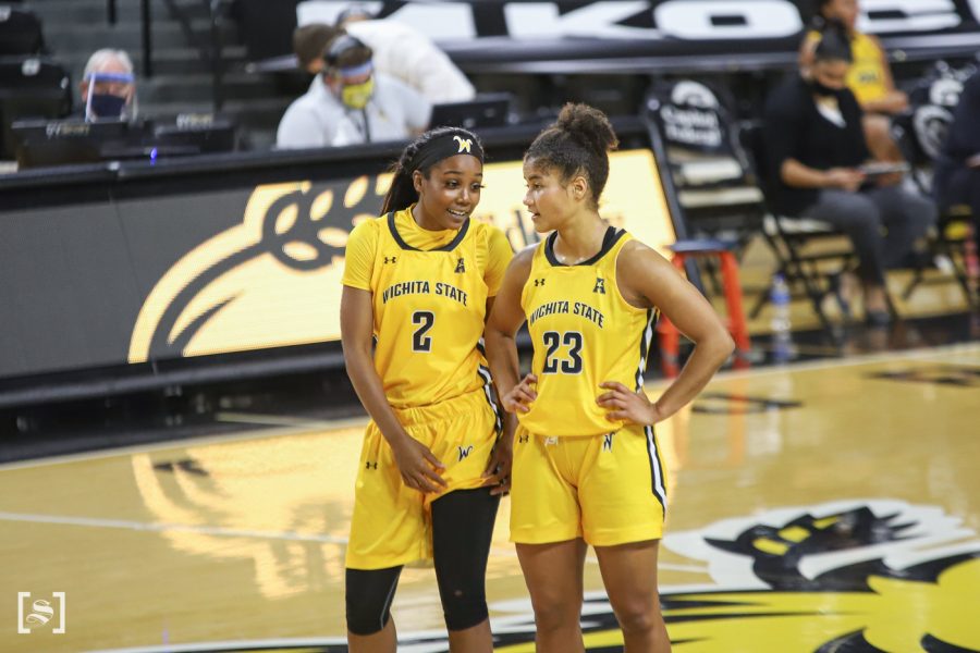 Wichita State senior Mariah McCully talks to junior Seraphine Bastin during the game against Northern Iowa on Dec. 6 at Koch Area.