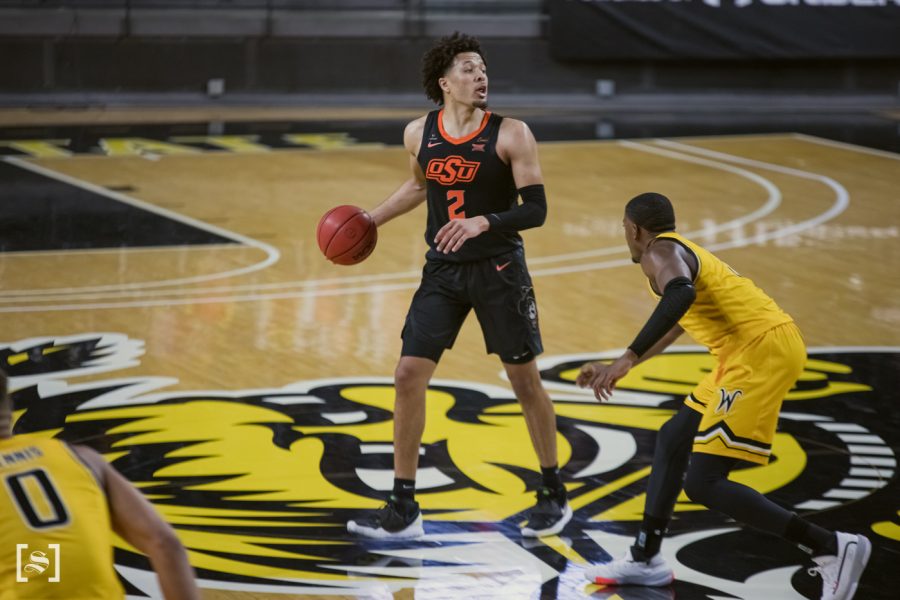 Oklahoma State freshman Cade Cunningham directs the offense during the game agaisnt Wichita State at Koch Area on Dec. 12.