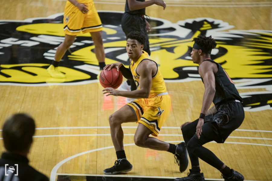 Wichita State junior Trevin Wade drives to the basket during the game against OSU at Charles Koch Arena on Dec.12.