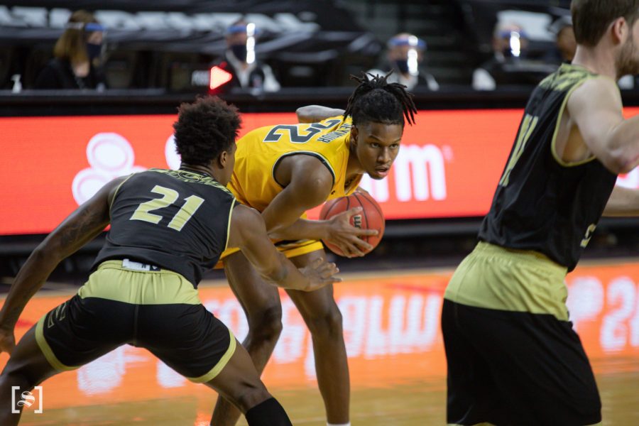 Wichita State freshman Jaden Seymour looks to pass during the game against ESU at Charles Koch Arena on Dec. 18.