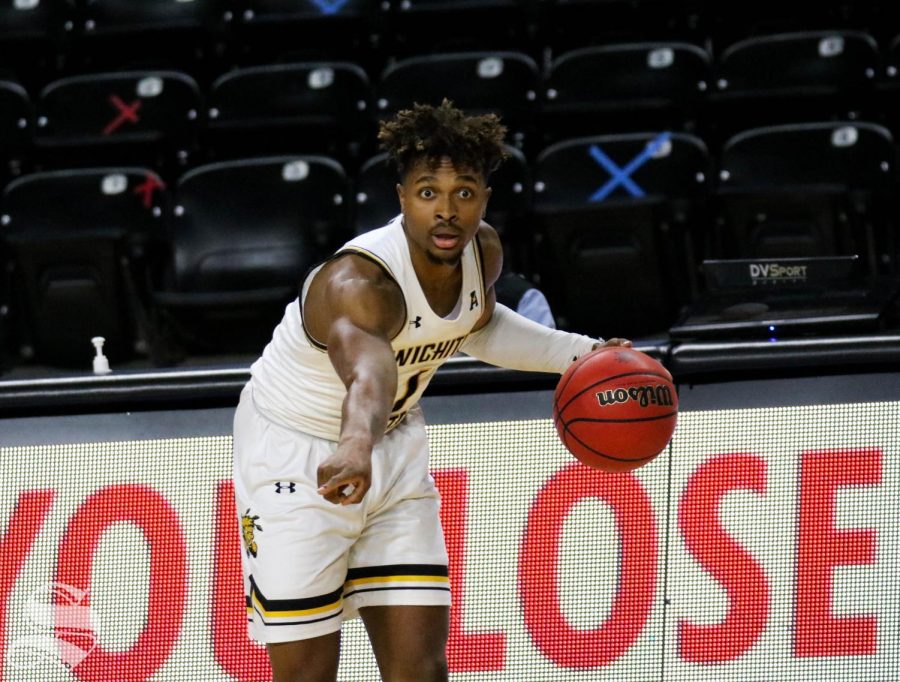 Wichita State sophomore, Tyson Etienne points to where his teammate should run to during a game against Oral Roberts University at Charles Koch Arena on Dec. 2.
