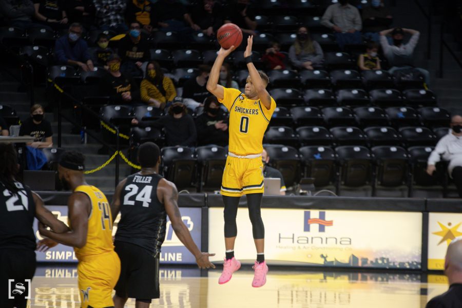 Wichita State junior Dexter Dennis goes up for a 3 pointer during the game against UCF at Charles Koch Arena on Jan. 30.