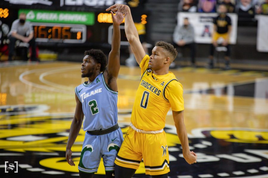 Wichita State junior Dexter Dennis shoot a 3-pointer during the game against Tulane at Charles Koch Arena on Feb. 3.