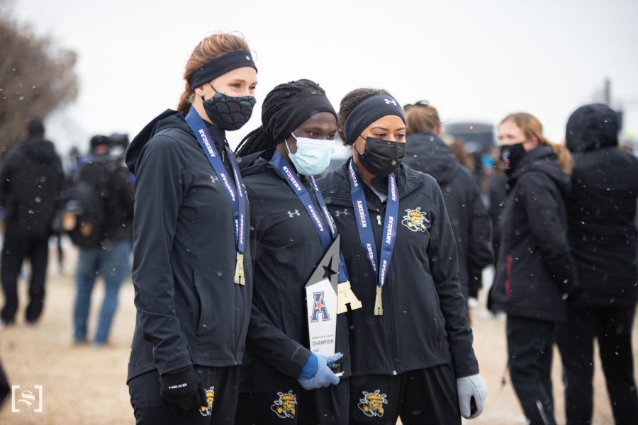 McKenna Paintin, Winny Koskei, and Yazmine Wright pose for picture after the awards ceremony. The American Athletic Conference Cross Country Championships was held at 4 Mile Creek Resort, on Feb 6.