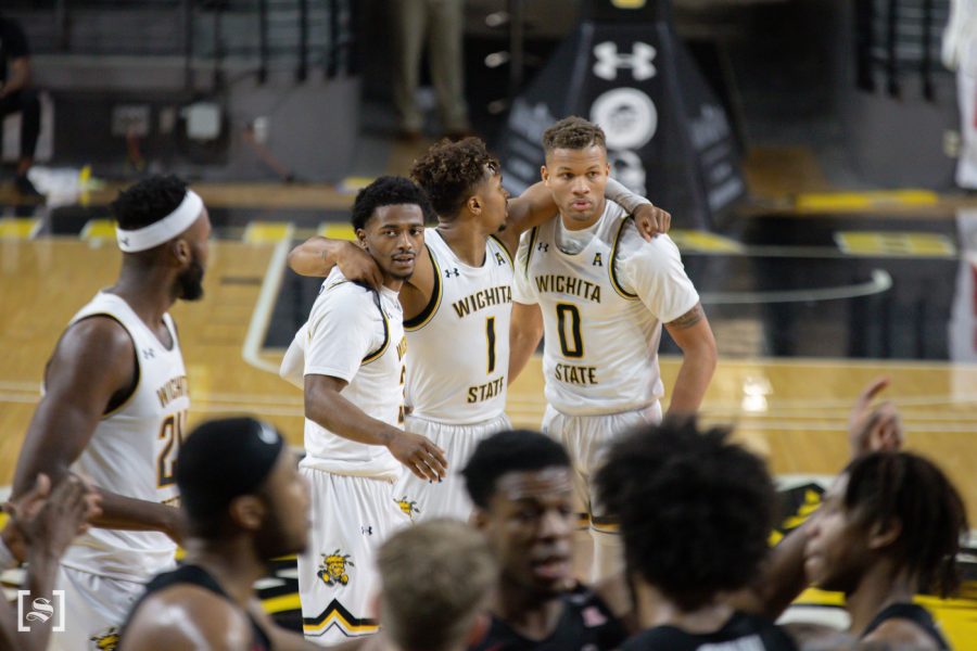 Wichita+State+players+gather+together+at+crunch+time+during+the+game+against+Temple+at+Charles+Koch+Arena+on+Feb.+7.