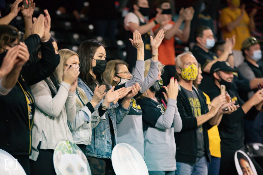 Fans cheer on the seniors during the presentation after the final game of the season at Charles Koch Arena.