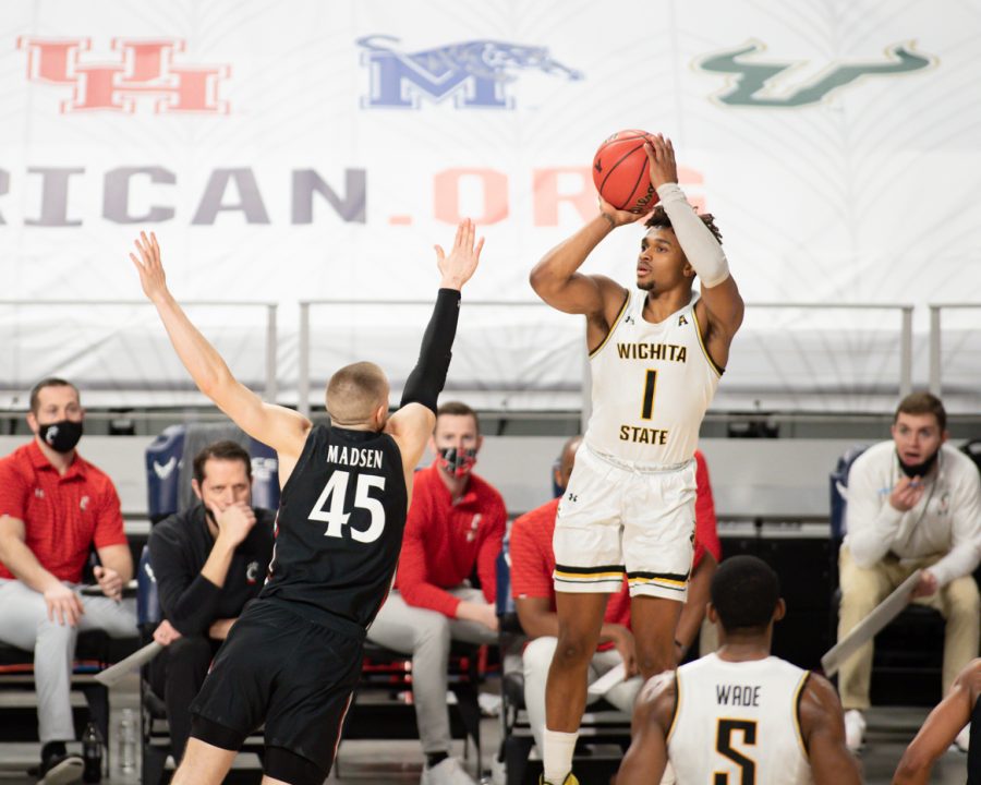 Wichita State sophomore Tyson Etienne goes for a jumper during the game against Cincinnati at Dickies Arena on Mar. 13.