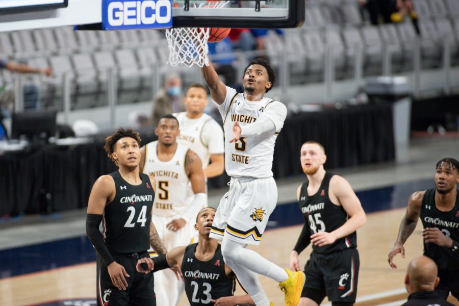 Wichita State redshirt senior Alterique Gilbert goes for a layup at the end of the game against Cincinnati at Dickies Arena on Mar. 13.