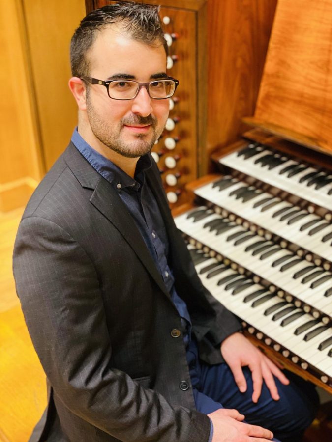 David Perez sits in front of his passion, the organ. He is a graduate student looking for a life of playing the organ.