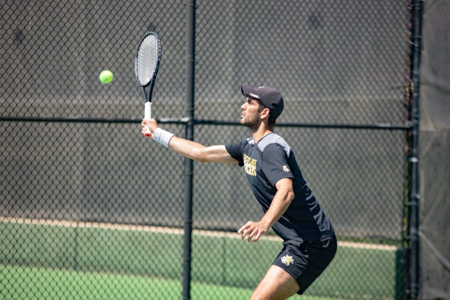 Wichita State Redshirt Sophomore Stefan Latinovic returns the ball during the game against the SMU Mustangs at the Coleman Tennis Complex on April 2, 2021.
