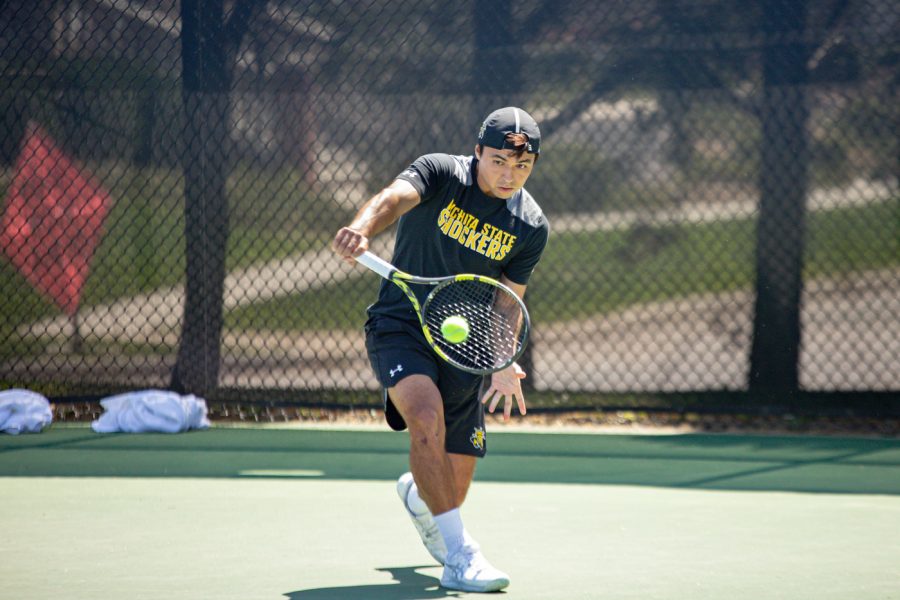 Wichita State Redshirt Sophomore Nicolas Acevedo returns the ball during the game against the SMU Mustangs at the Coleman Tennis Complex on April 2, 2021.