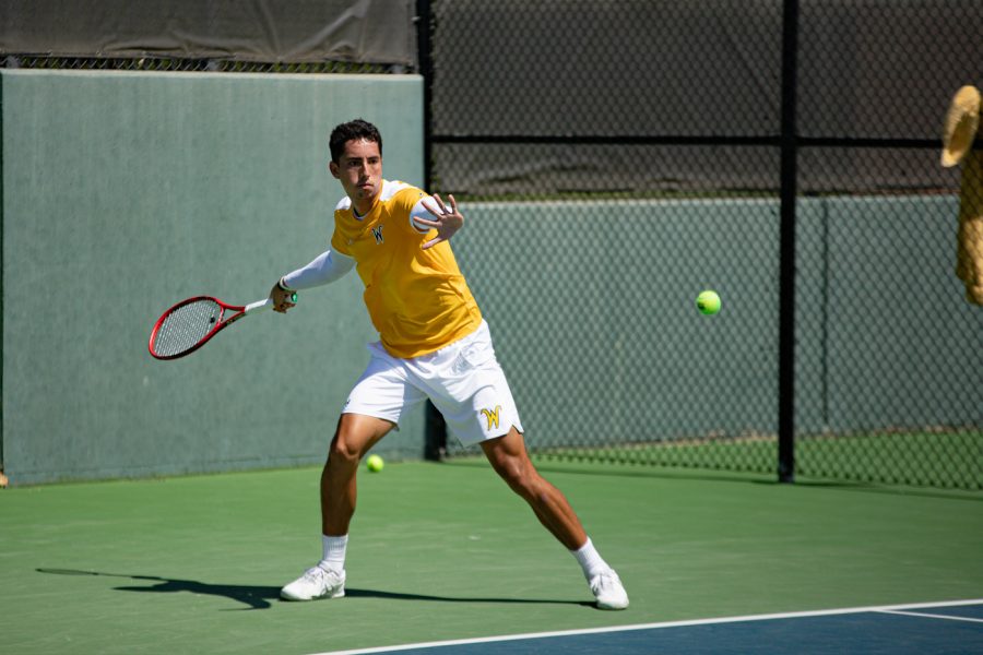 Wichita State Redshirt Senior Murkel Dellien returns the ball  during the game against Pepperdine at the Coleman Tennis Complex on April 4, 2021.