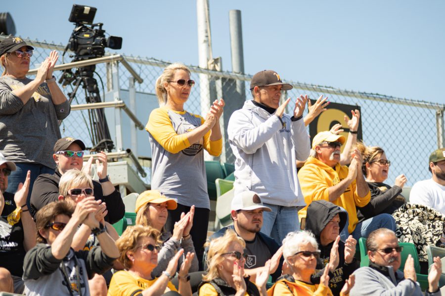 Neleigh Herrings parents cheer on their daughter during the game against South Florida at Wilkins Stadium on April 25.