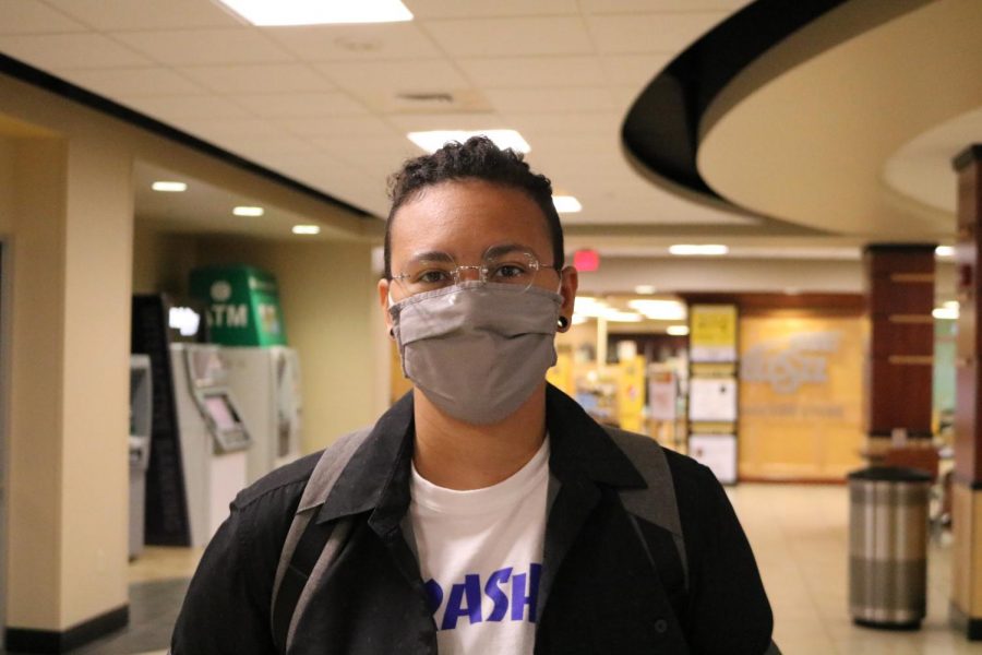 Courtney Minor poses for a photo in the Rhatigan Student Center.