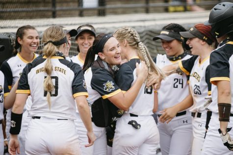 Wichita State players celebrate after a home-run during the game against UCF on May 15.