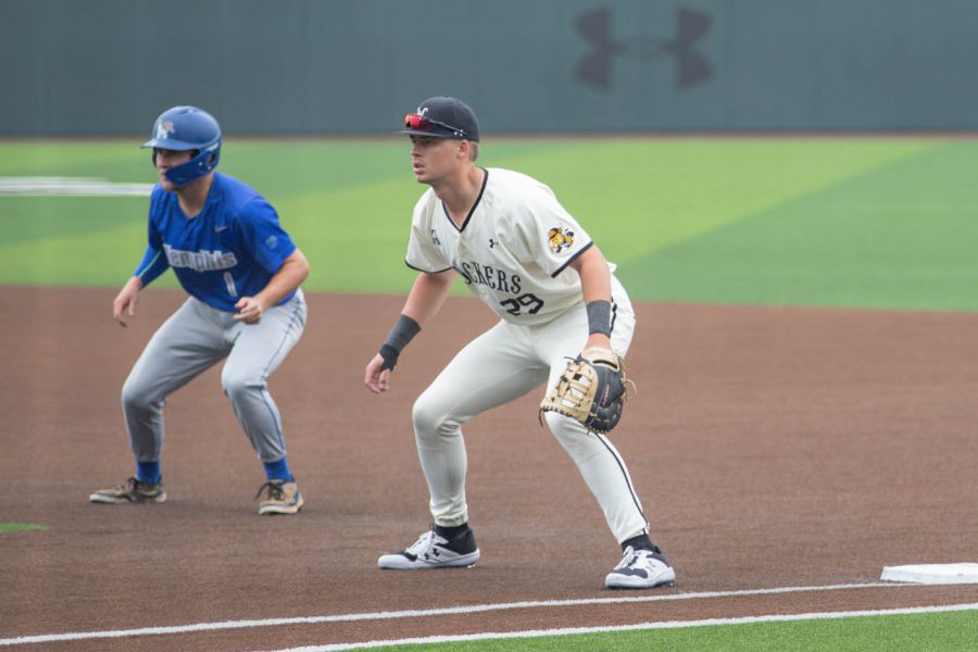 Wichita State junior Garrett Kocis stands at first base during the game against the Memphis Tigers at Eck Stadium on May 22, 2021.