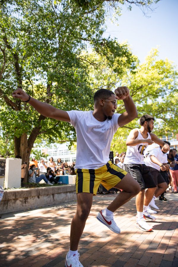 Charles Williams of Alpha Phi Alpha fraternity strolls during yard show on Aug 24.